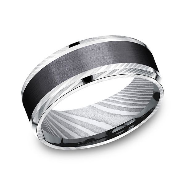 Men's black and silver wedding band with a patterned interior.