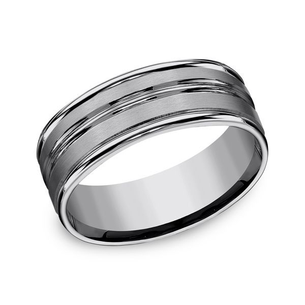 Silver wedding band with a brushed center and polished edges.