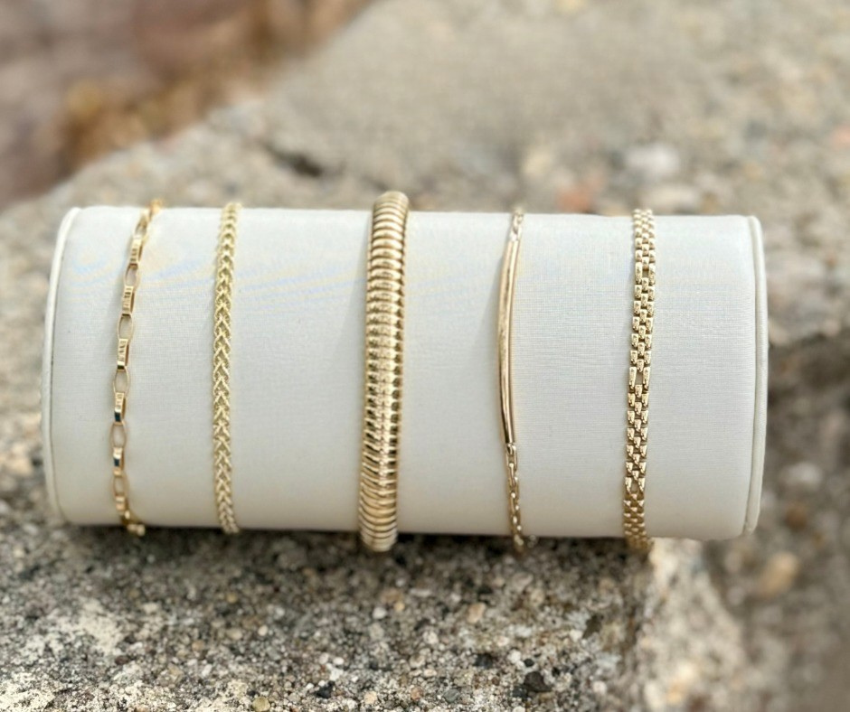 Five gold bracelets 