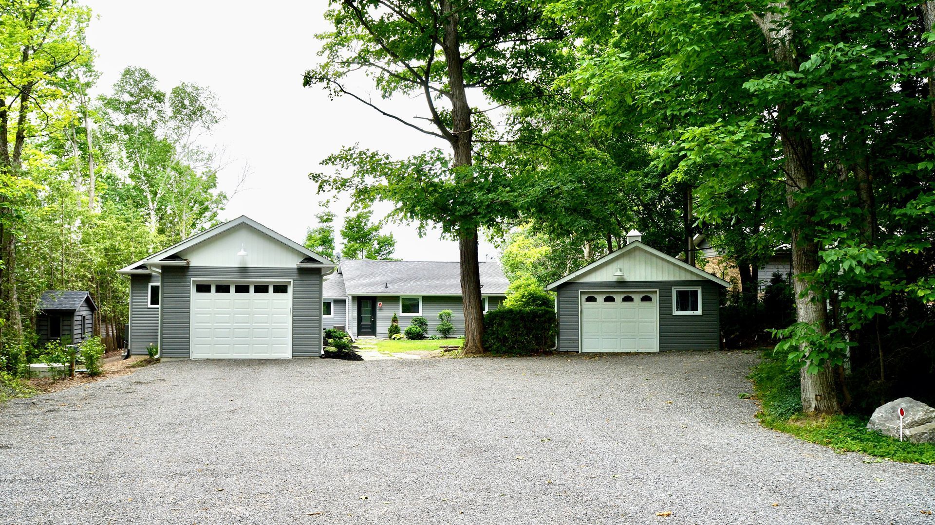 Custom home renovation with two garages