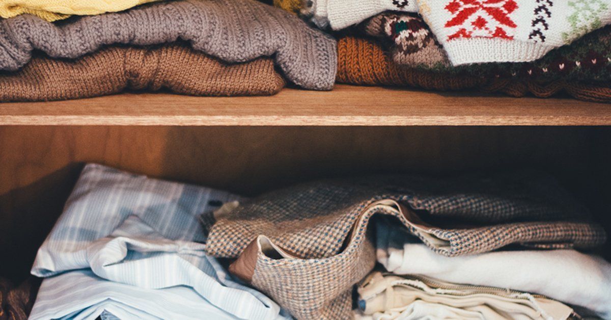 folded clothes in closet