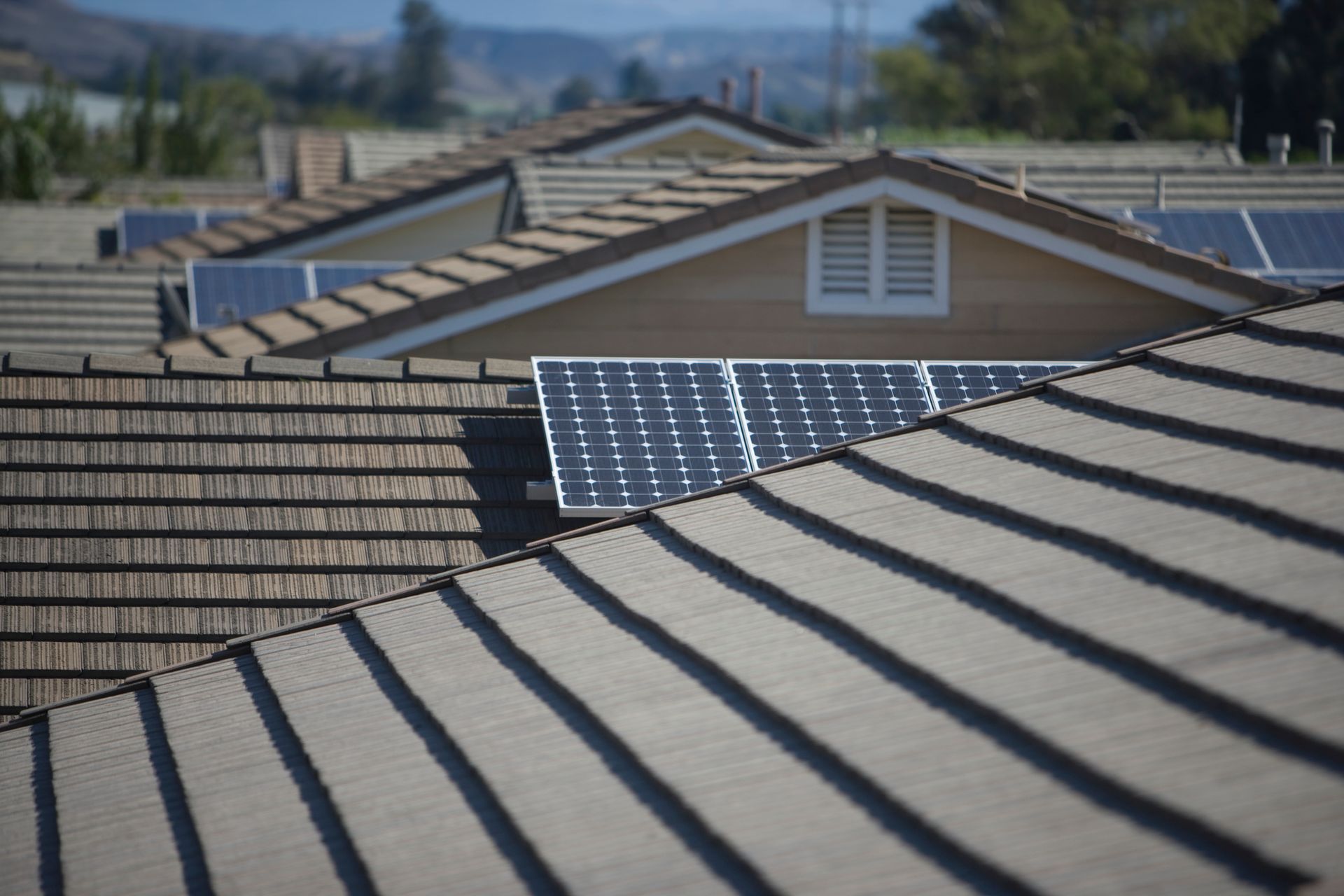 A roof with a lot of solar panels on it