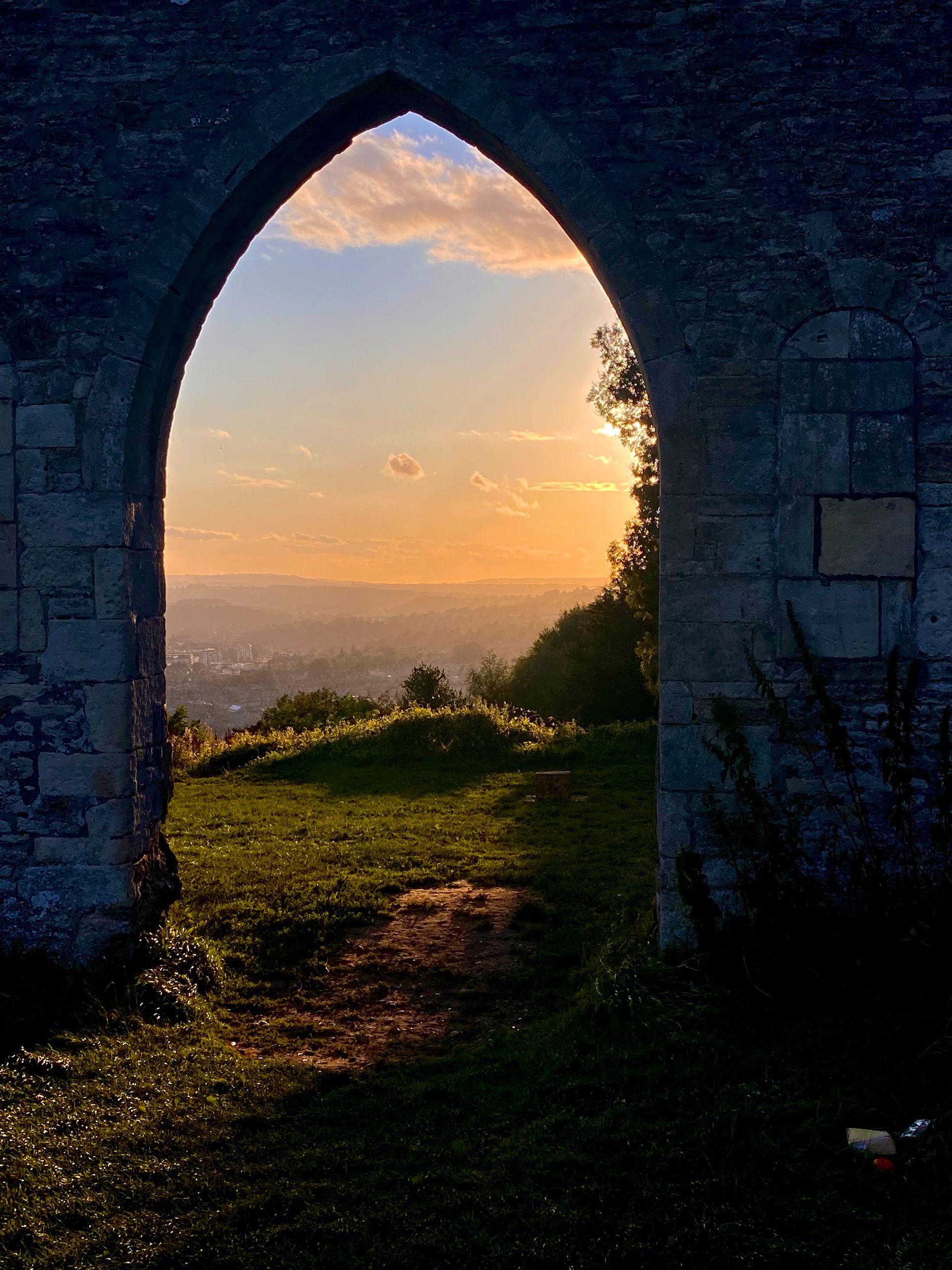 a doorway in an old castle overlooking bath england.