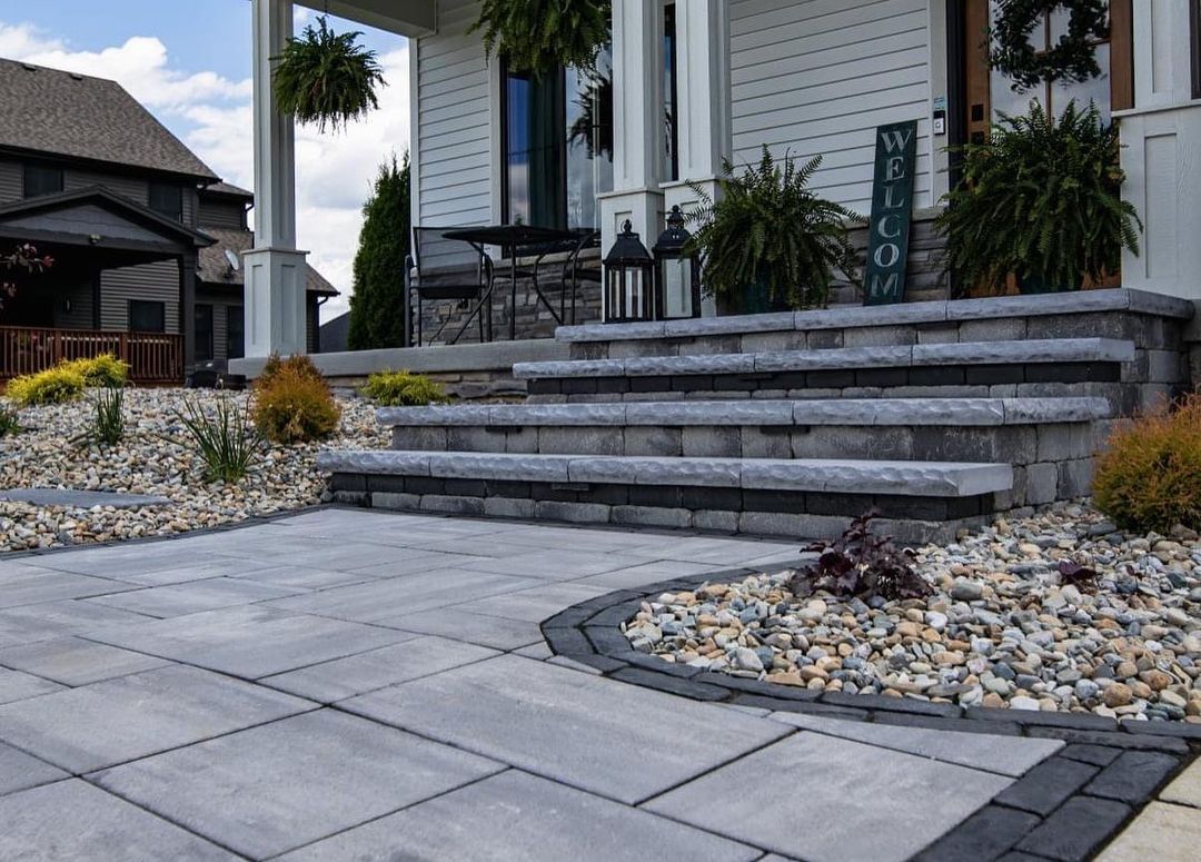 There are steps leading up to the front of a house.