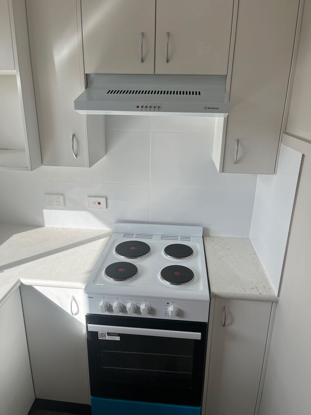 A New Gas Stove with Oven — Electrician in Kempsey, NSW