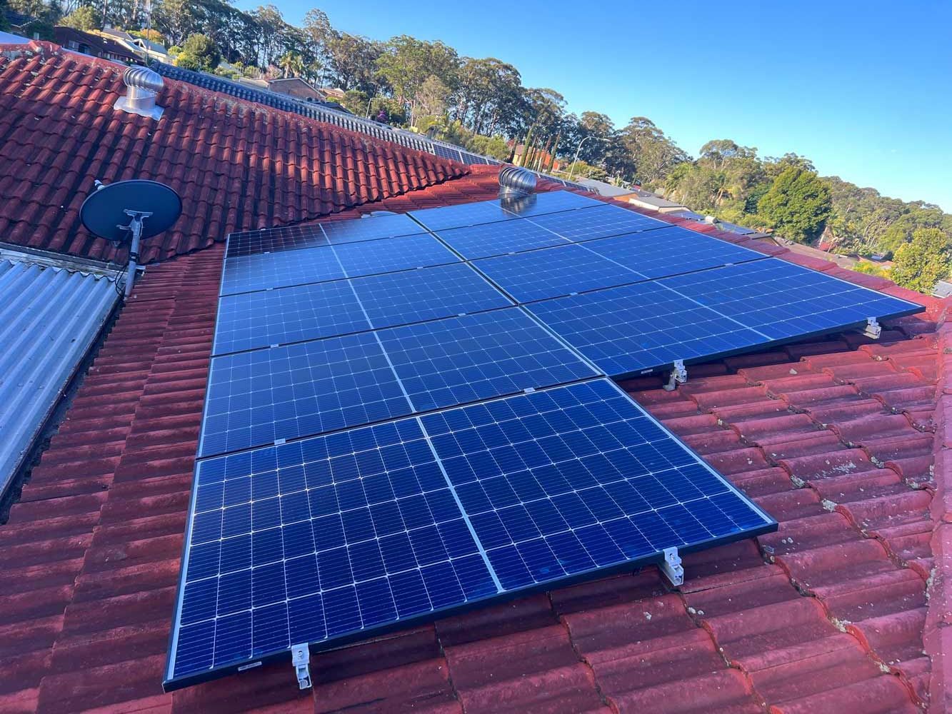 A Roof with Solar Panels — Electrician in Port Macquarie, NSW