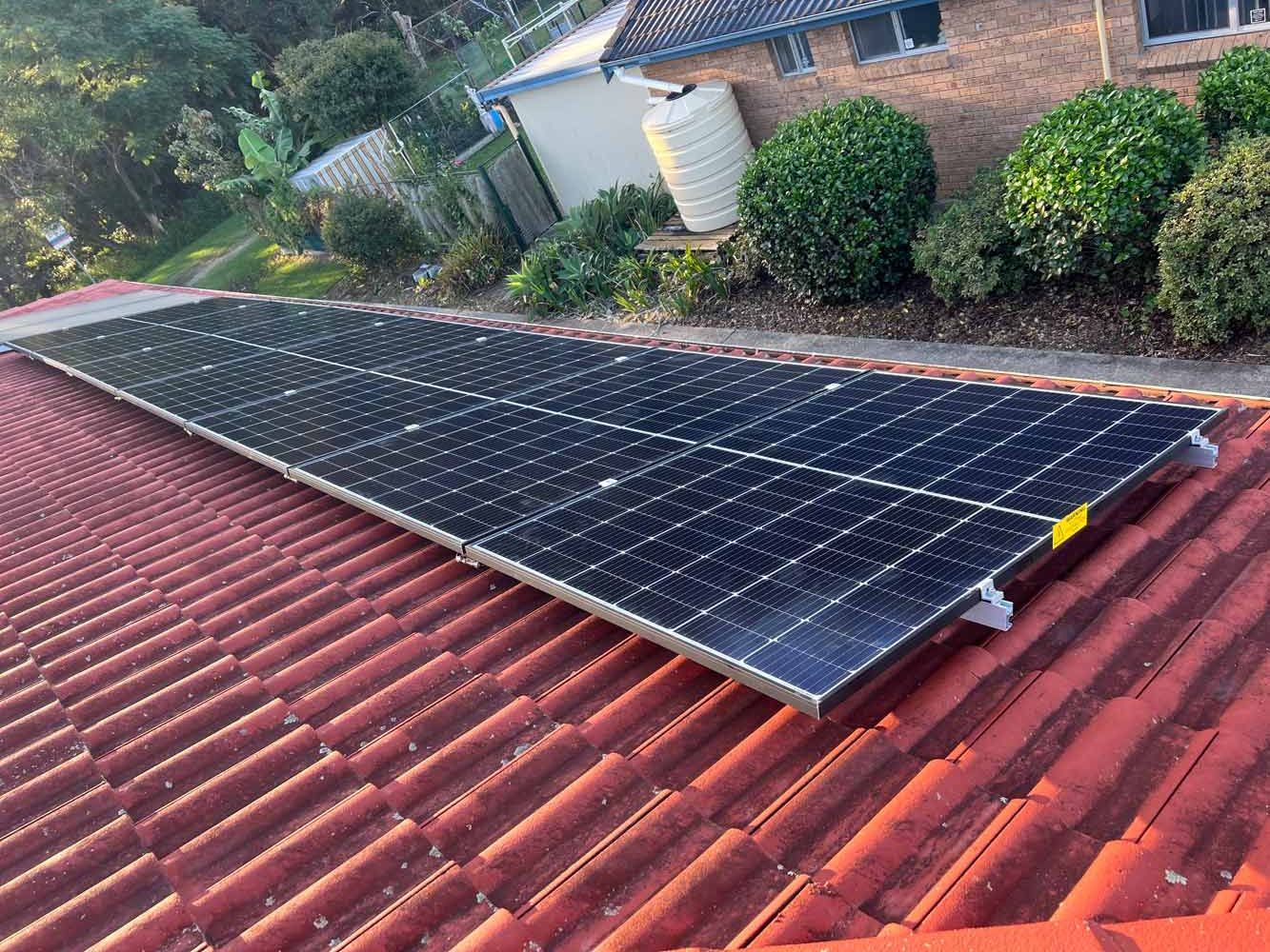 Solar Panels in a Small House — Electrician in Laurieton, NSW