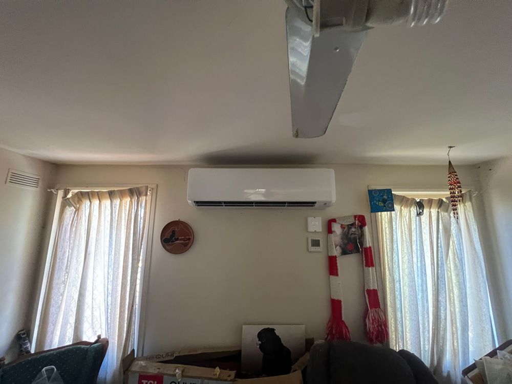 A Split Type Air-Conditioner in a Room — Electrician in Armidale, NSW