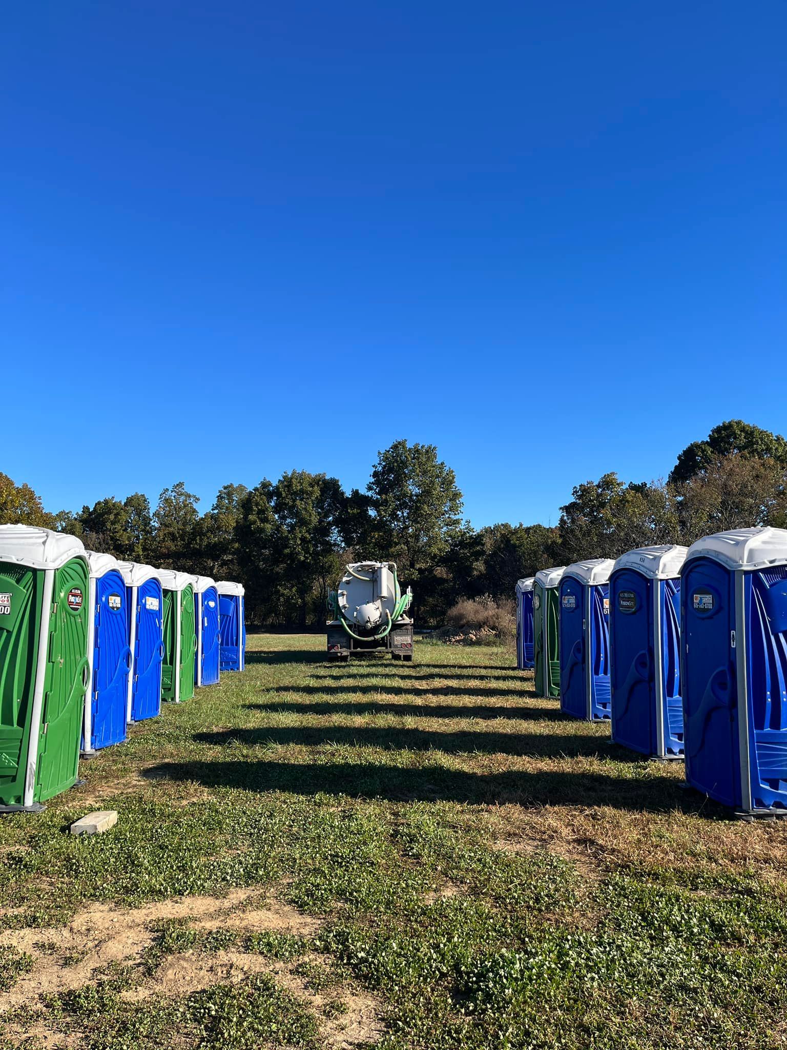 New portable toilets for rent getting dropped off at event | East Springfield, MO