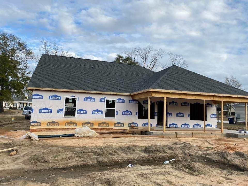 A House Being Built In The Middle Of A Dirt Field — Enterprise, AL — Waters Roofing LLC