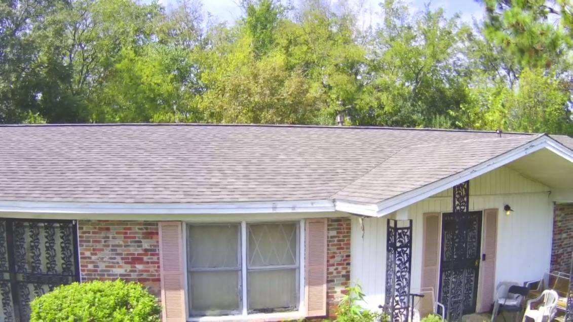 A Brick House With A Gray Roof — Enterprise, AL — Waters Roofing LLC