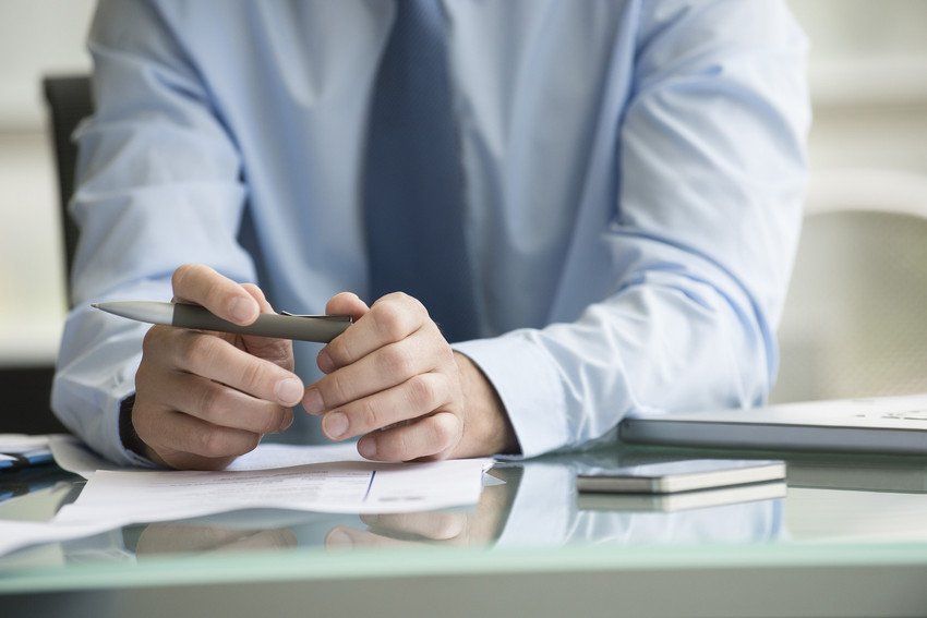 Financial advisor making notes