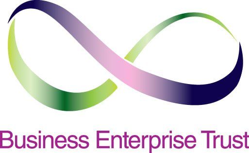 a logo for business enterprise trust with an infinity symbol
