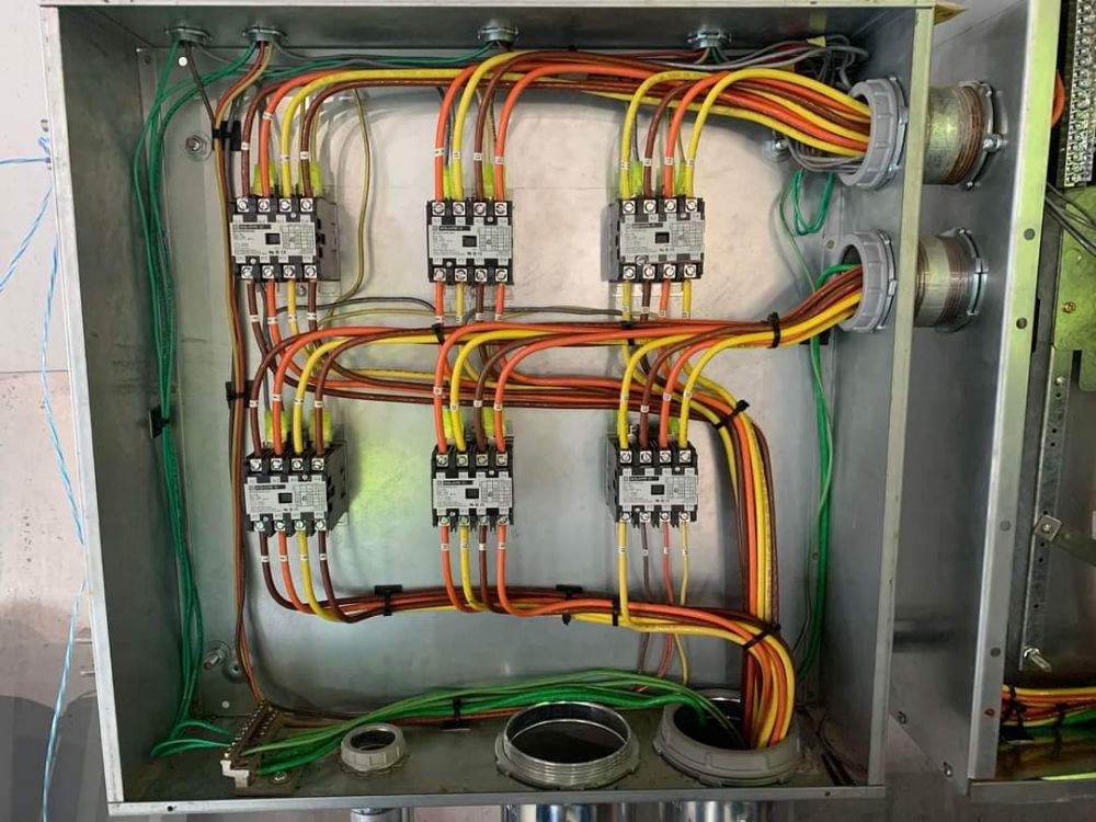 A box with a lot of wires coming out of it