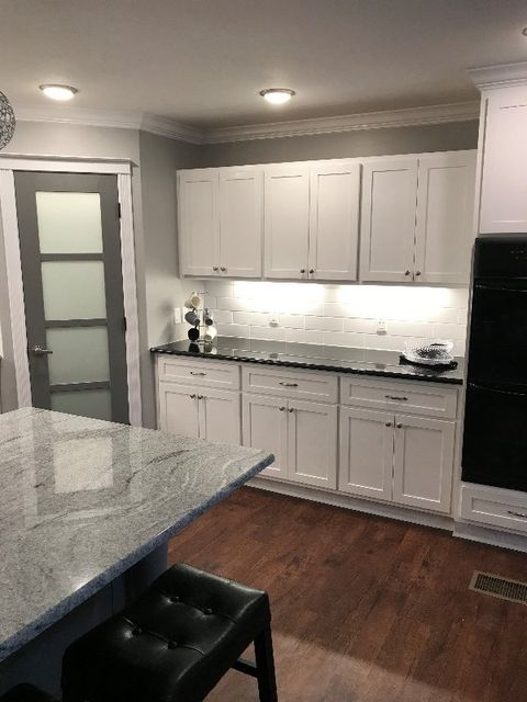 white kitchen draw with center table