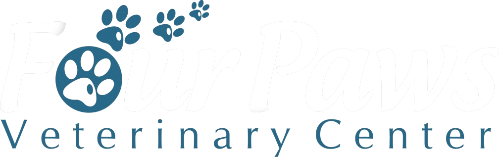 Logo of a veterinary center with blue paw prints and text