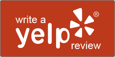 Red Yelp review button with white text and logo. Reads 