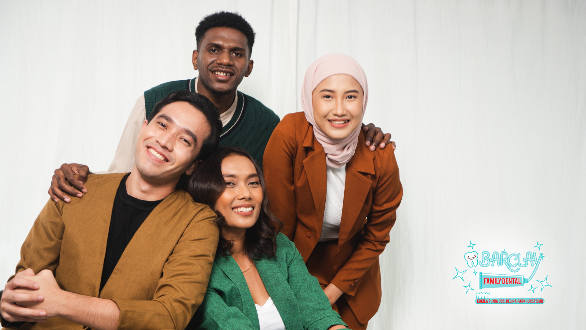 A group of people are posing for a picture together.