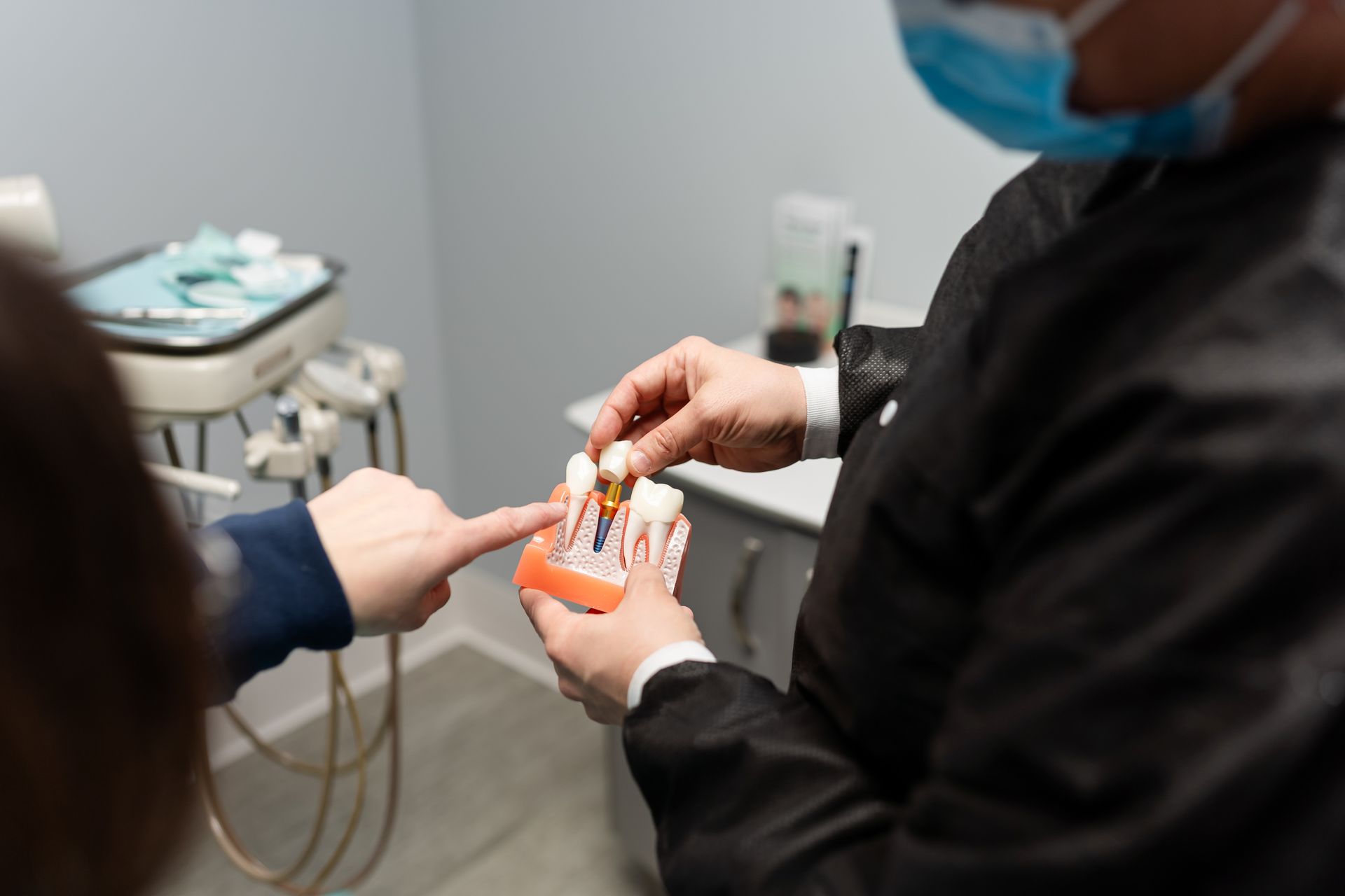 a man and a woman are hugging each other and smiling | Barclay Family Dental | Best Dentist For Family Dentistry, Dental Implants, and Cosmetic Dentistry in Cherry Hill, NJ