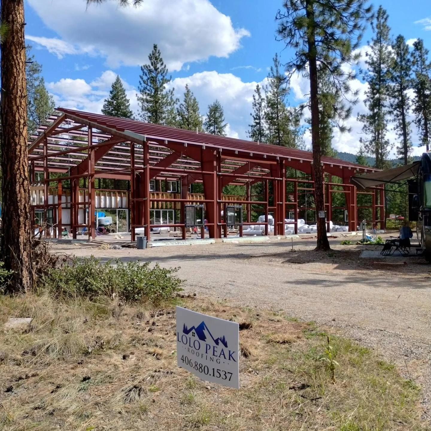 A building under construction with a sign that says cold peak
