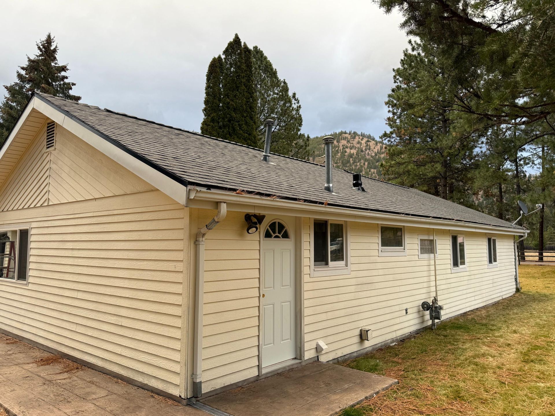 A bathroom with a bathtub , sink , toilet and bidet.