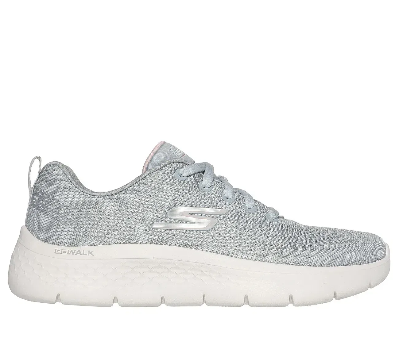 Zapatilla deportiva Skechers gris y blanca con cordones.