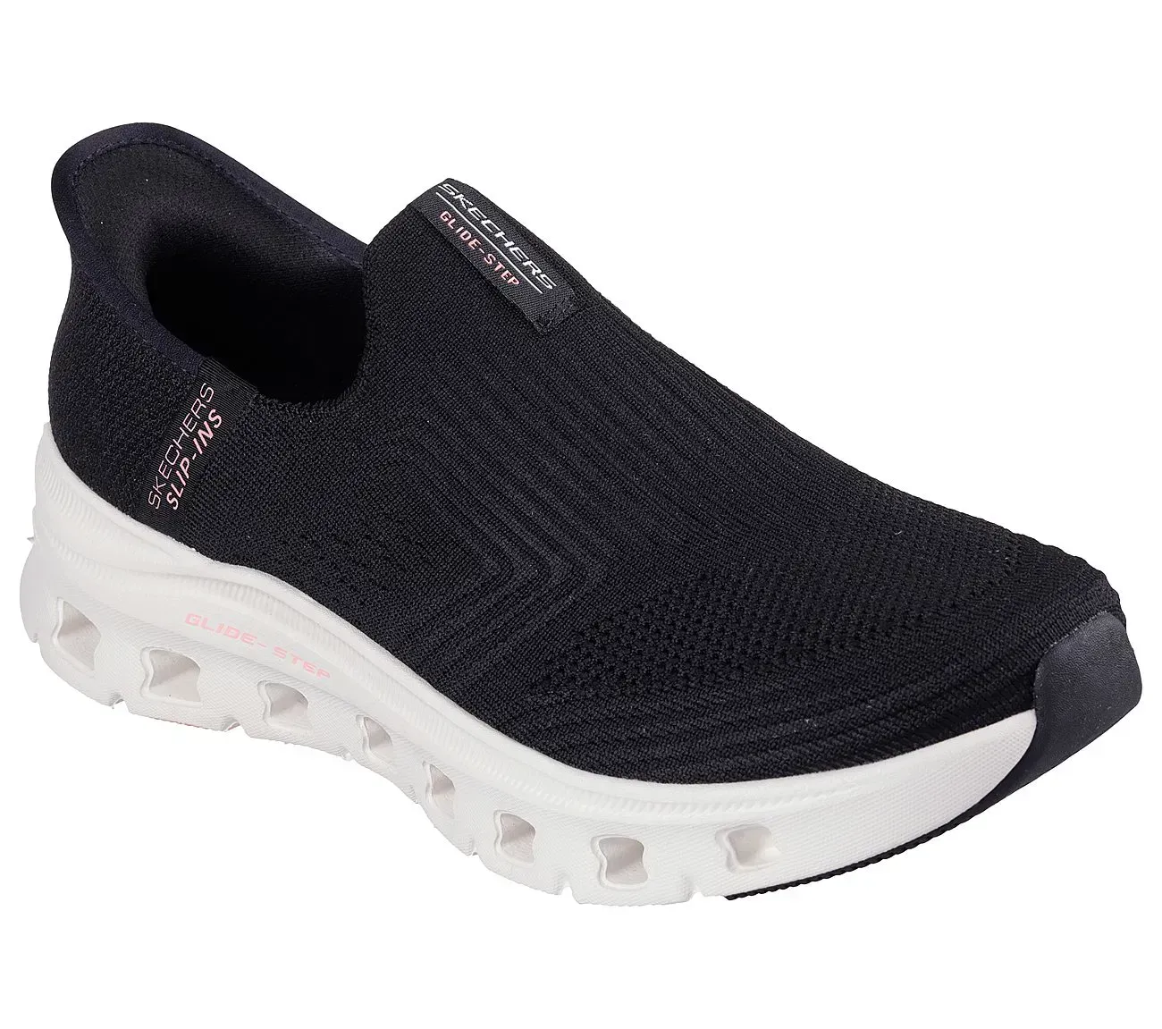 Zapatilla deportiva Skechers negra sin cordones con suela blanca luminosa.