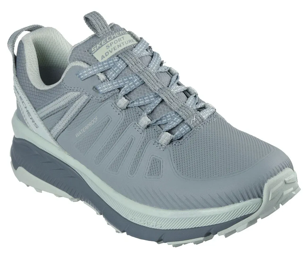 Zapatilla Skechers Sport Adventure gris con detalles en azul claro.