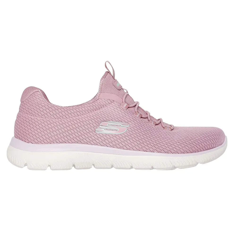 Zapatilla deportiva Skechers de color lila claro con suela blanca.