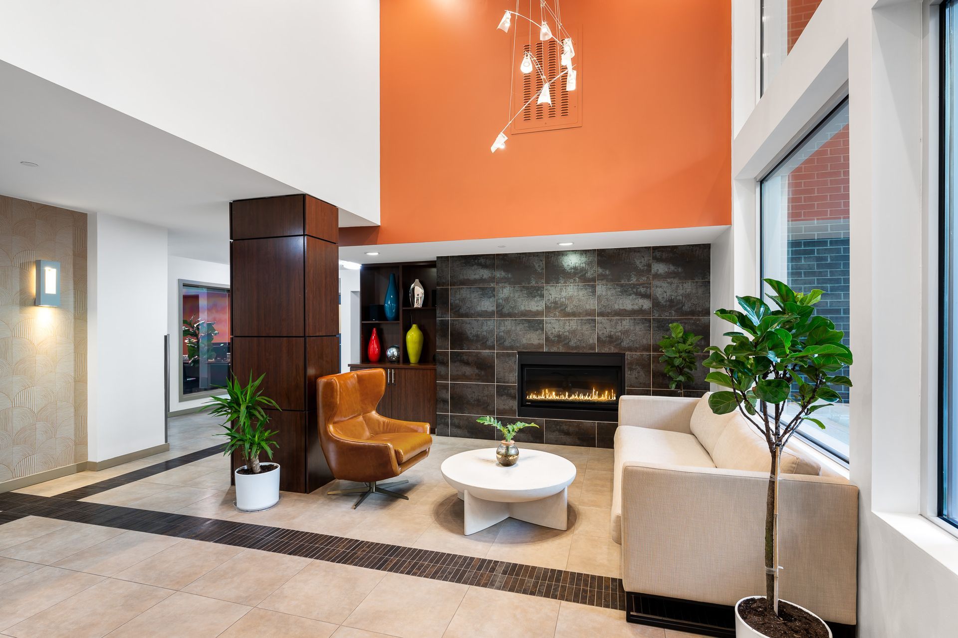 Photo of the lobby, showing a chair and a couch