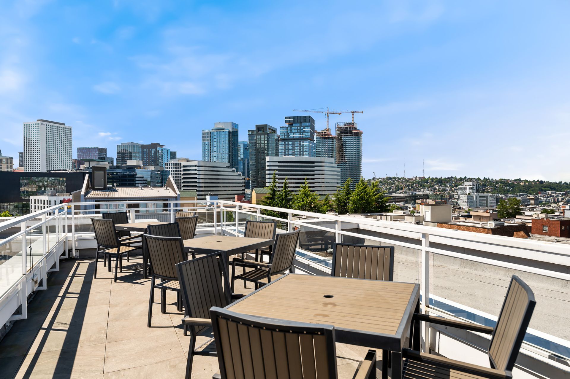 Photo of a rooftop lounge with plenty of seating