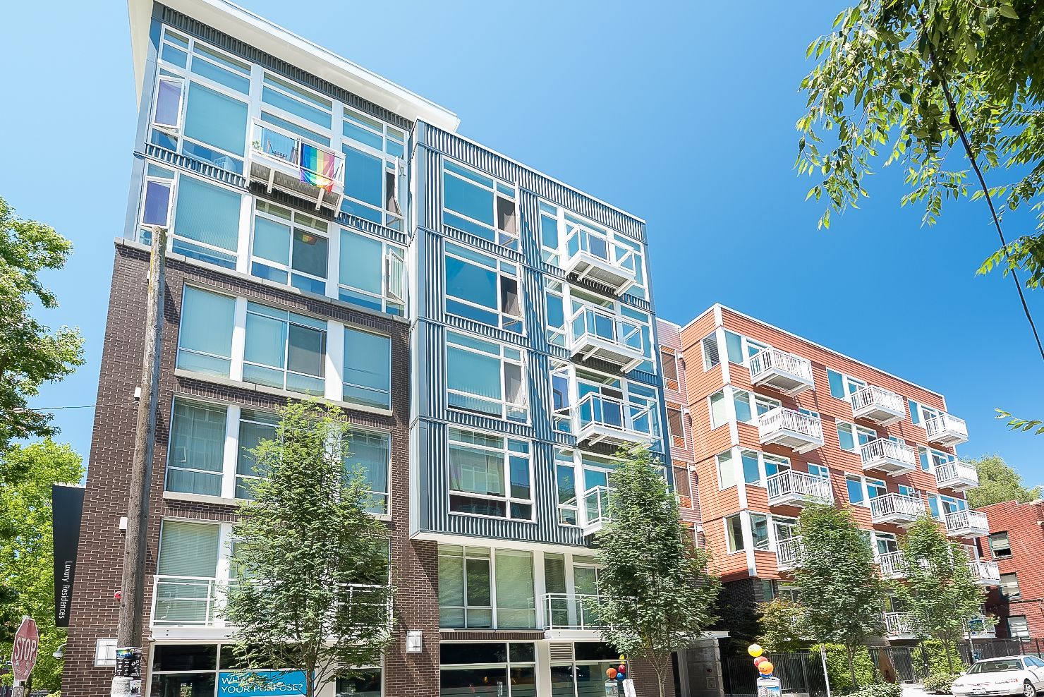 Photo of the building, seen from across the street and downstairs
