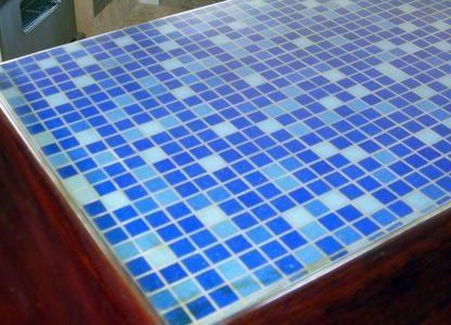 A table with blue and white tiles on it