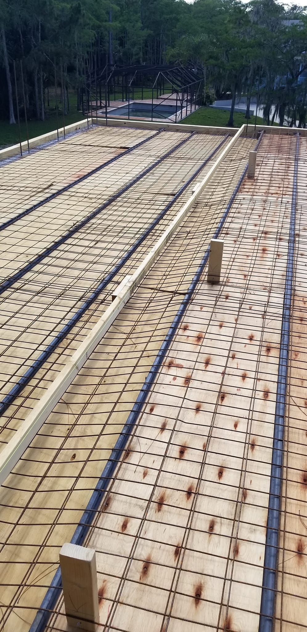 A roof with a lot of holes in it is being built.