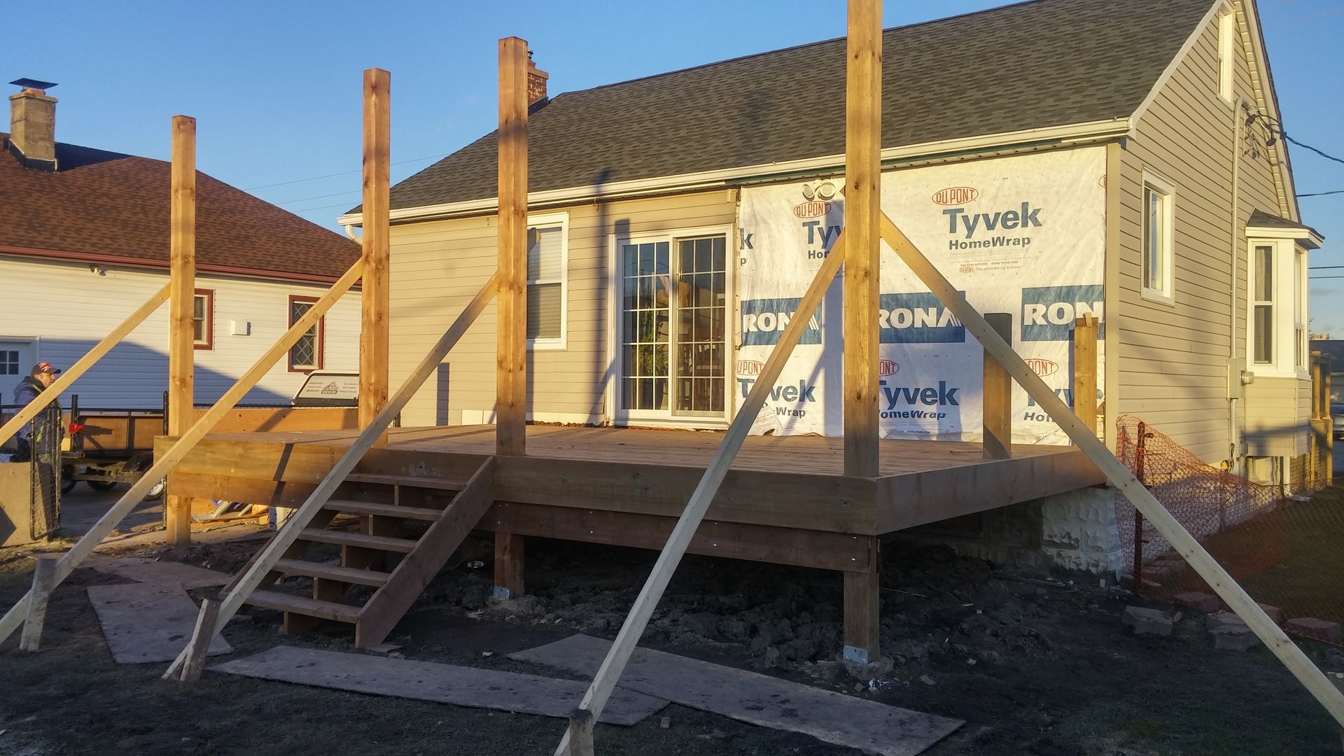 A house with styrofoam on the side of it