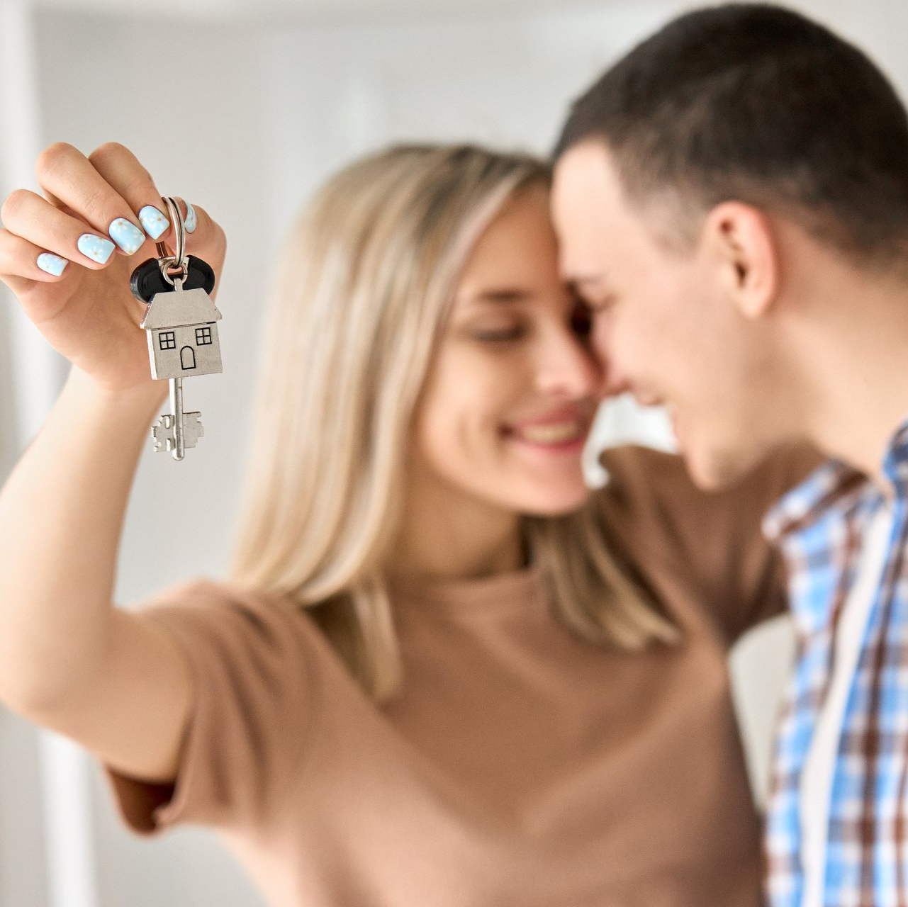 Happy couple that just bought a new home