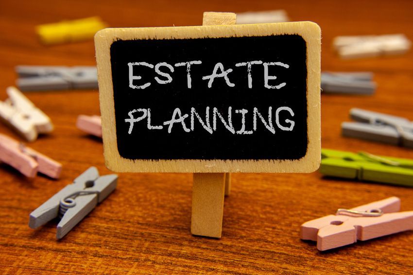 A Small Chalkboard With the Words "Estate Planning" — Budd & Piper Solicitors & Conveyancers in Tweed Heads, NSW