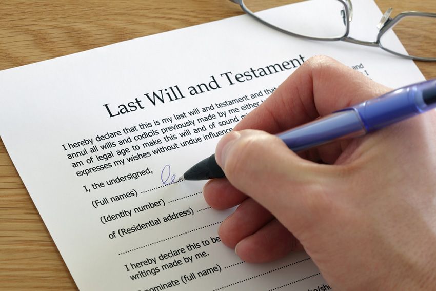 A Person is Signing a Last Will and Testament — Budd & Piper Solicitors & Conveyancers in Tweed Heads, NSW