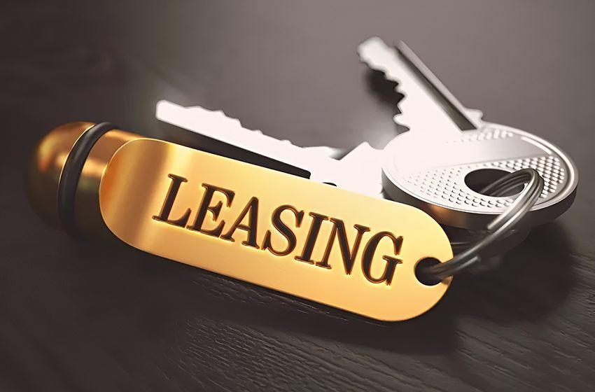 A Bunch of Keys With a Keychain That Says Leasing on It — Budd & Piper Solicitors & Conveyancers in Tweed Heads, NSW
