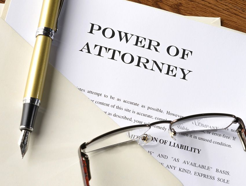 A Pen and Glasses Are on Top of a Power of Attorney — Budd & Piper Solicitors & Conveyancers in Tweed Heads, NSW