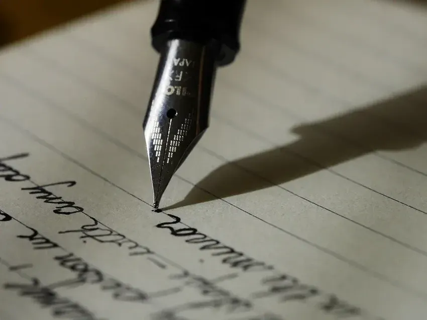 A Close Up of a Fountain Pen Writing on a Piece of Paper — Budd & Piper Solicitors & Conveyancers in Tweed Heads, NSW
