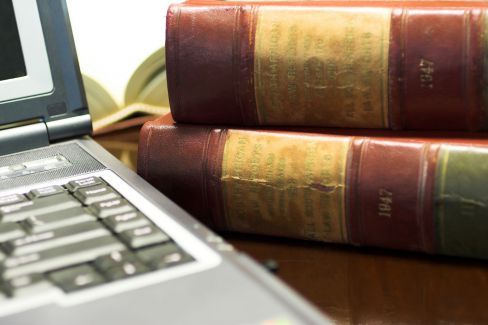 Laptop and law books for an attorney in Lonoke, AR