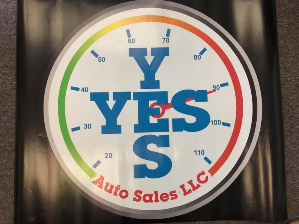 A colorful logo for y yes auto sales llc