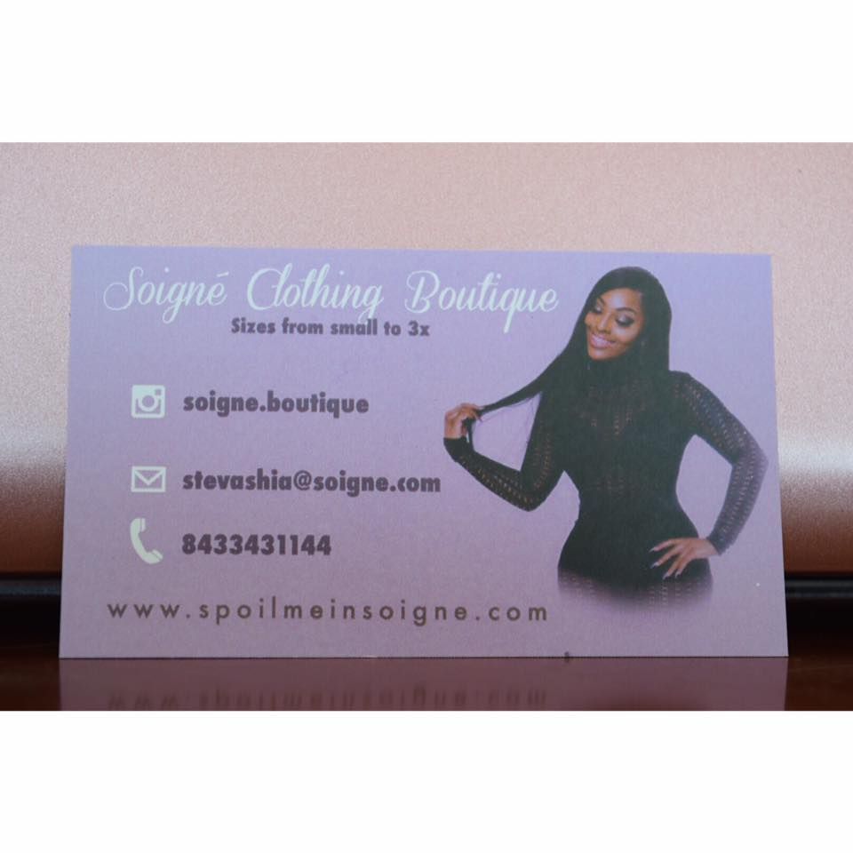 A business card for a clothing boutique with a woman on it