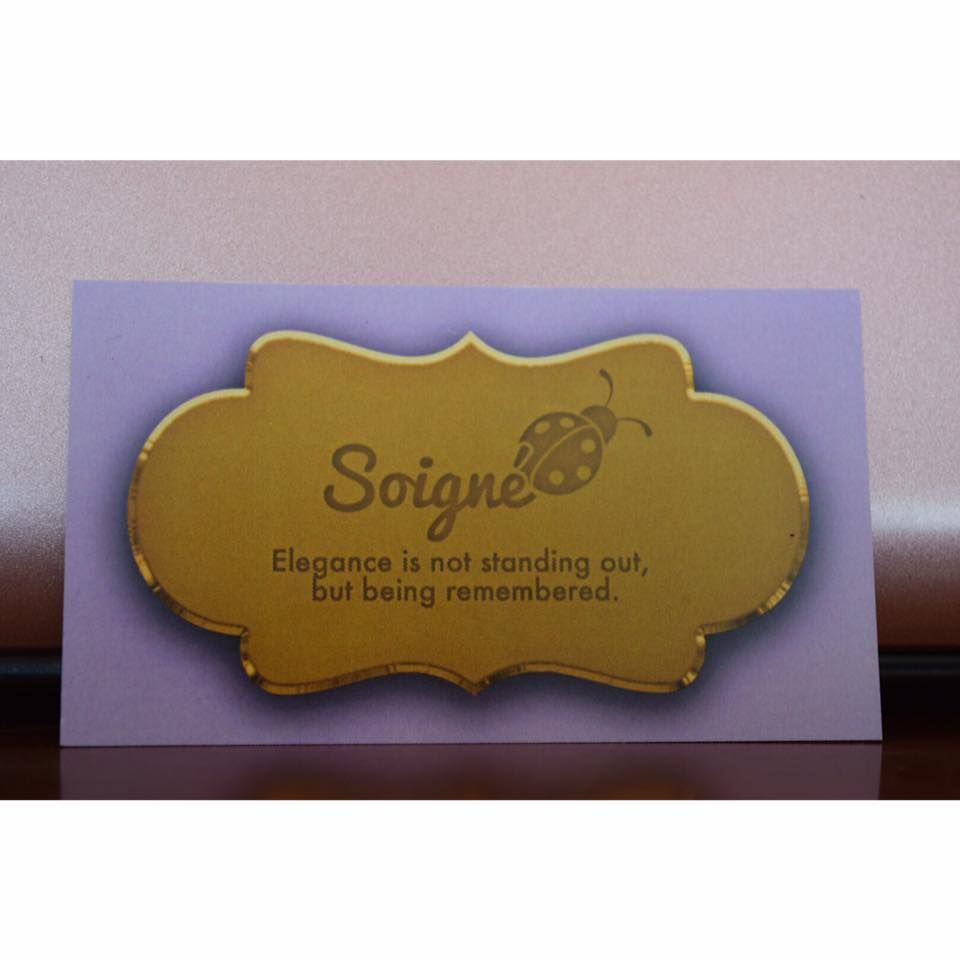 A business card that says elegance is not standing out but being remembered