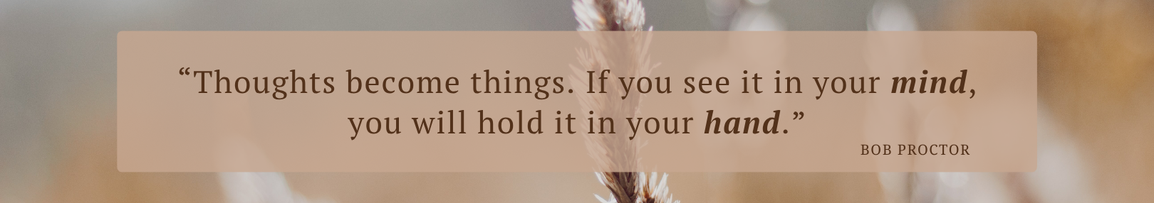 Motivational quote in black cursive on a beige brush-stroke background.