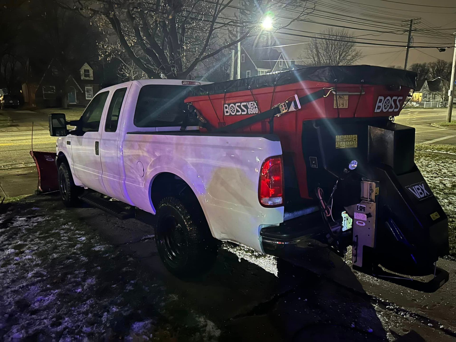 Truck with a Snow Plow Attached to the Back — Northeast OH — Believeland Landscaping and Snow Removal