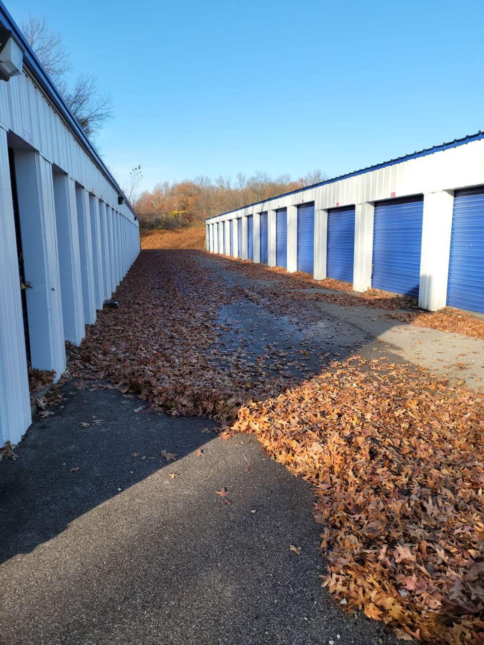 Row of Storage Units with Blue Doors — Northeast OH — Believeland Landscaping and Snow Removal