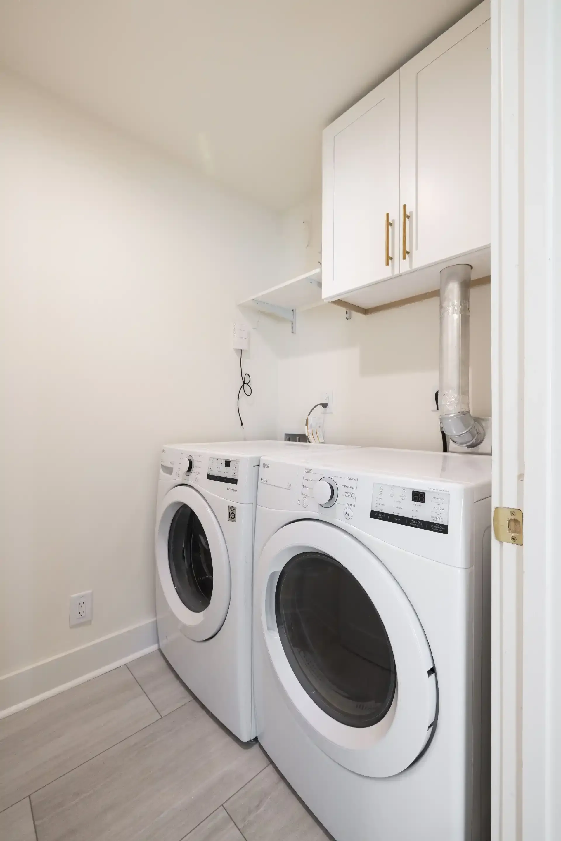 In unit washer and dryer at Ilion Apartments in Marietta, GA.