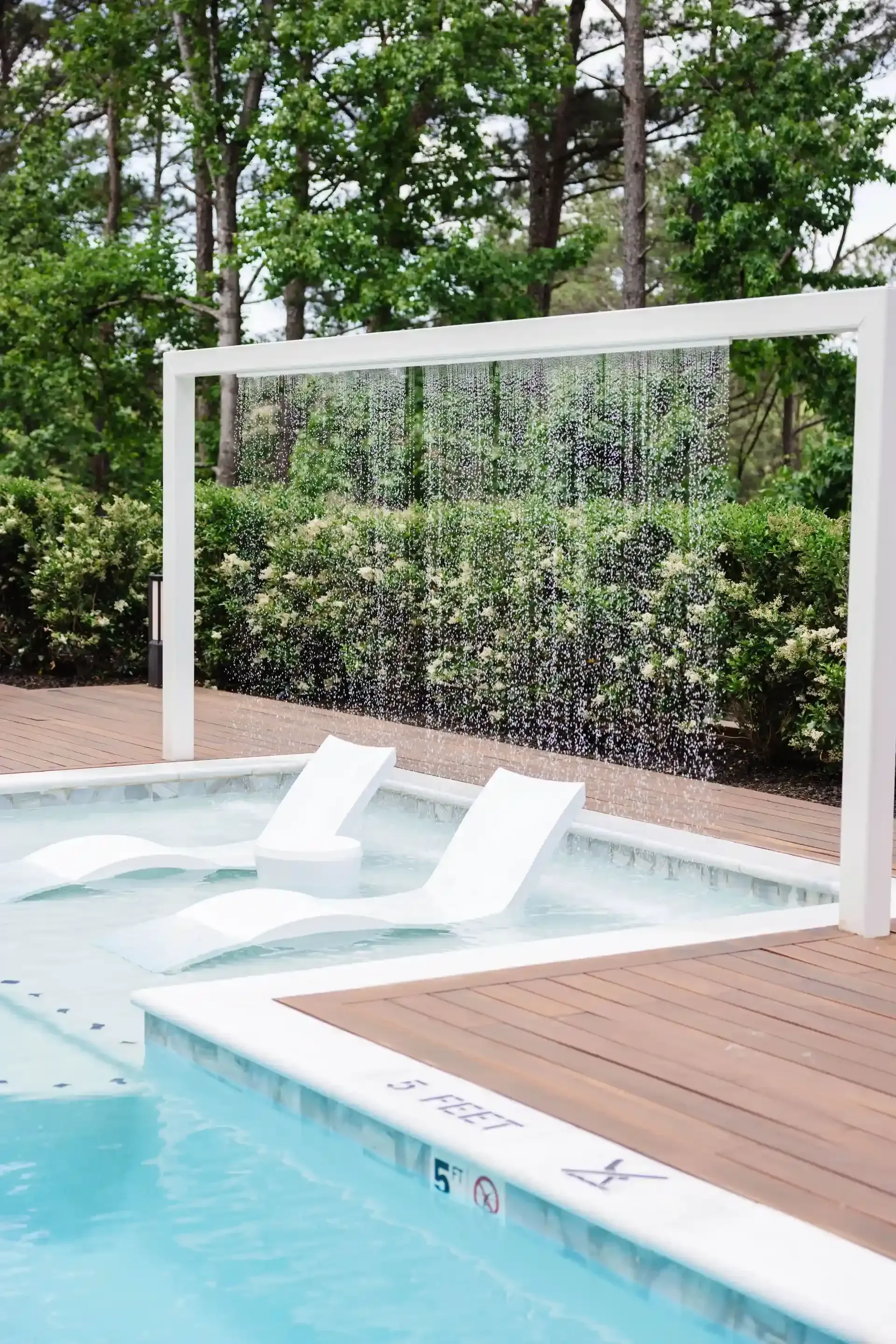 Pool with Lounge Chairs at Ilion Apartments Marietta, GA. 
